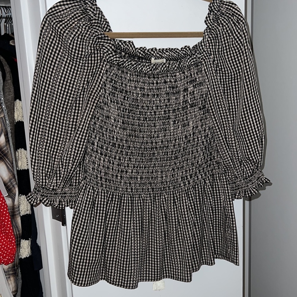 Black and white checkered peplum top